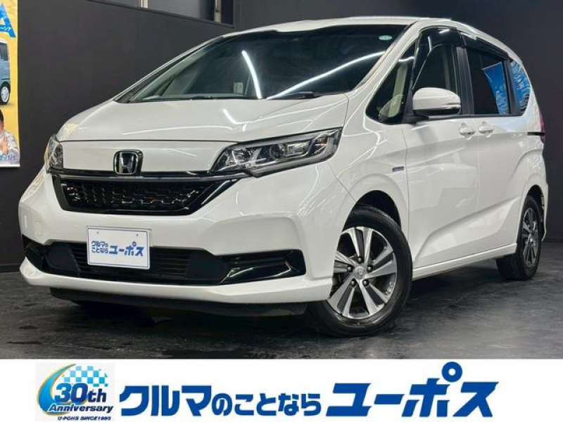 ホンダ フリード＋ ハイブリッドG・ホンダセンシング　両側パワースライドドア　バックモニター　ETC　クルーズコントロール　シートヒーター　後席サンシェード　純正SDナビ（CD／DVD／Bluetooth／フルセグ）