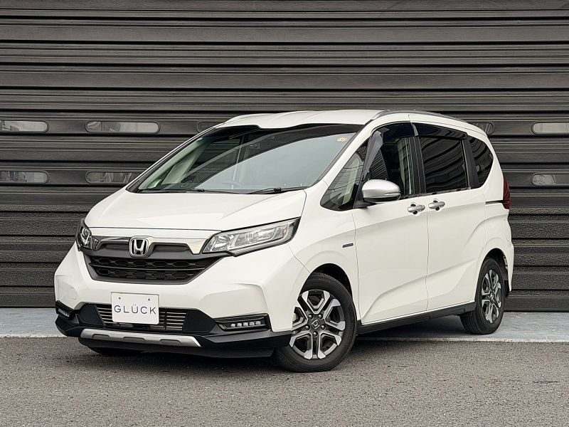 ホンダ フリード＋ 1.5ハイブリッド クロスターHondaSENSING 1オーナー 禁煙車 9インチインターナビ 前後ドラレコ 両側パワースライドドア ハーフレザー バックカメラ フロントシートヒーター LEDヘッドランプ Bluetooth 純正15AW ACC デジタルTV DVD/CDプレーヤー