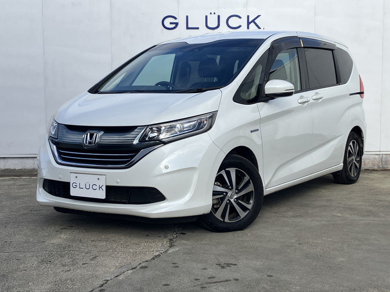ホンダ フリード ハイブリッドG　ホンダセンシング7人乗り/1オーナー/ホンダセンシング/両側電動ドア/アダプティブクルーズ/純正ナビ/バックカメラ/15AW/LEDライト/